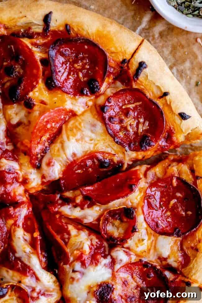 Foolproof Pizza Dough for Newbies 23 pizza with pepperoni made with pizza dough from scratch.
