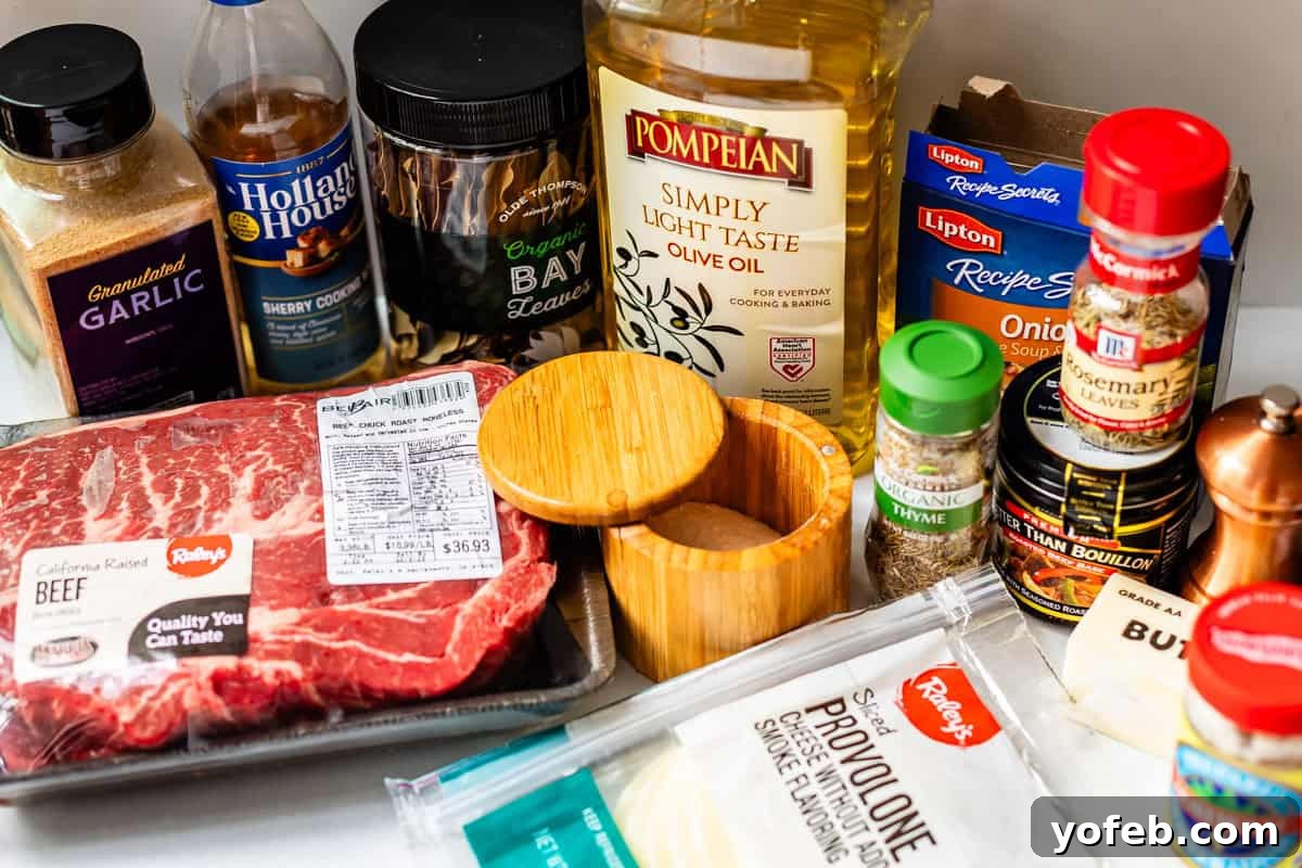 Ultimate Slow Cooker French Dip Sandwiches 7 A variety of essential ingredients laid out on a kitchen counter for making French Dip Sandwiches, including a large chuck roast, slices of provolone cheese, a bottle of olive oil, various seasonings like dried thyme and rosemary, a jar of Better Than Bouillon Beef Base, bay leaves, and a packet of dry onion soup mix, alongside cooking sherry wine.