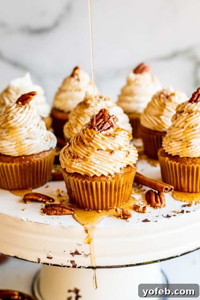 Maple Pecan Frosted Pumpkin Spice Cupcakes 5 Close-up of creamy maple pecan frosting, perfect for topping fall desserts.