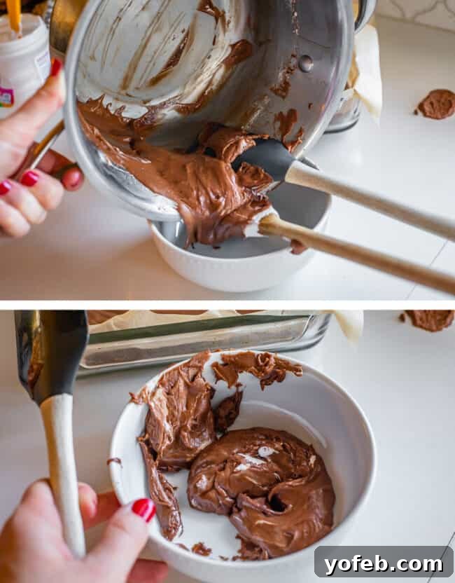Mom's Effortless Fudge 26 A hand scraping the last bits of fudge from a pot with a spatula, adding them to a small white bowl, reserving the perfect main batch.