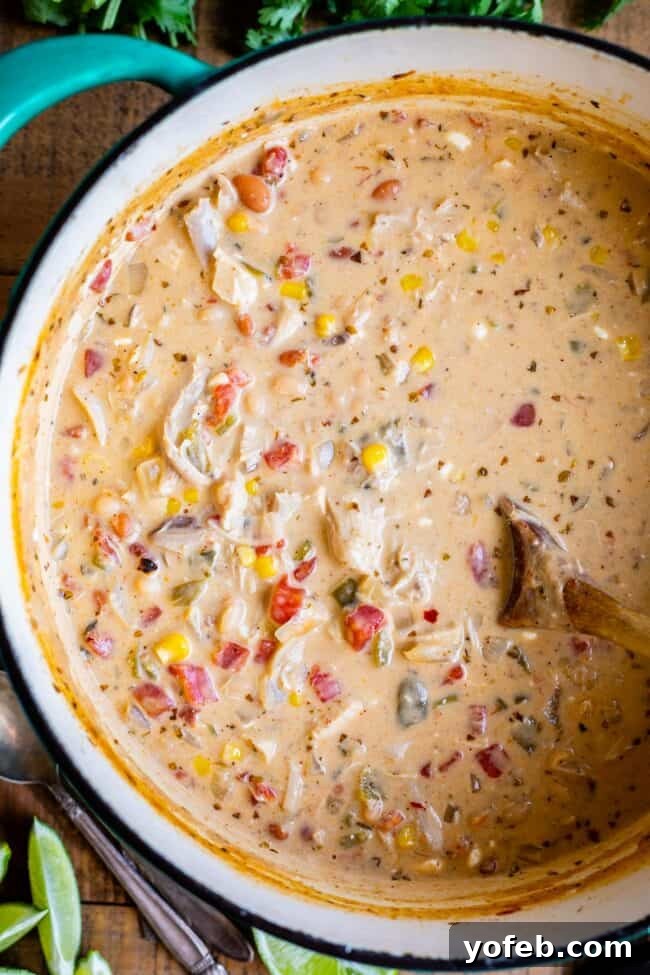 Effortless Creamy White Chicken Chili 17 A large pot filled with easy white chicken chili, ready to serve.