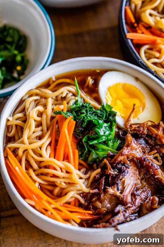 Slow Cooker Pork Ramen Deep Flavor Zero Fuss 12 pork ramen recipe in a white bowl with egg and carrots