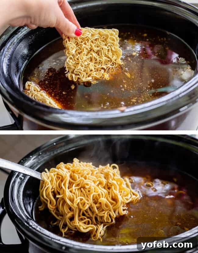 Slow Cooker Pork Ramen Deep Flavor Zero Fuss 18 adding noodles to a crock pot full of broth