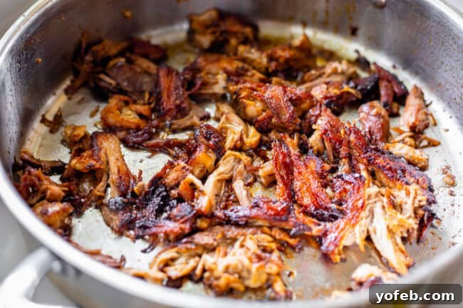 Slow Cooker Pork Ramen Deep Flavor Zero Fuss 20 crispy shredded pork in a pan