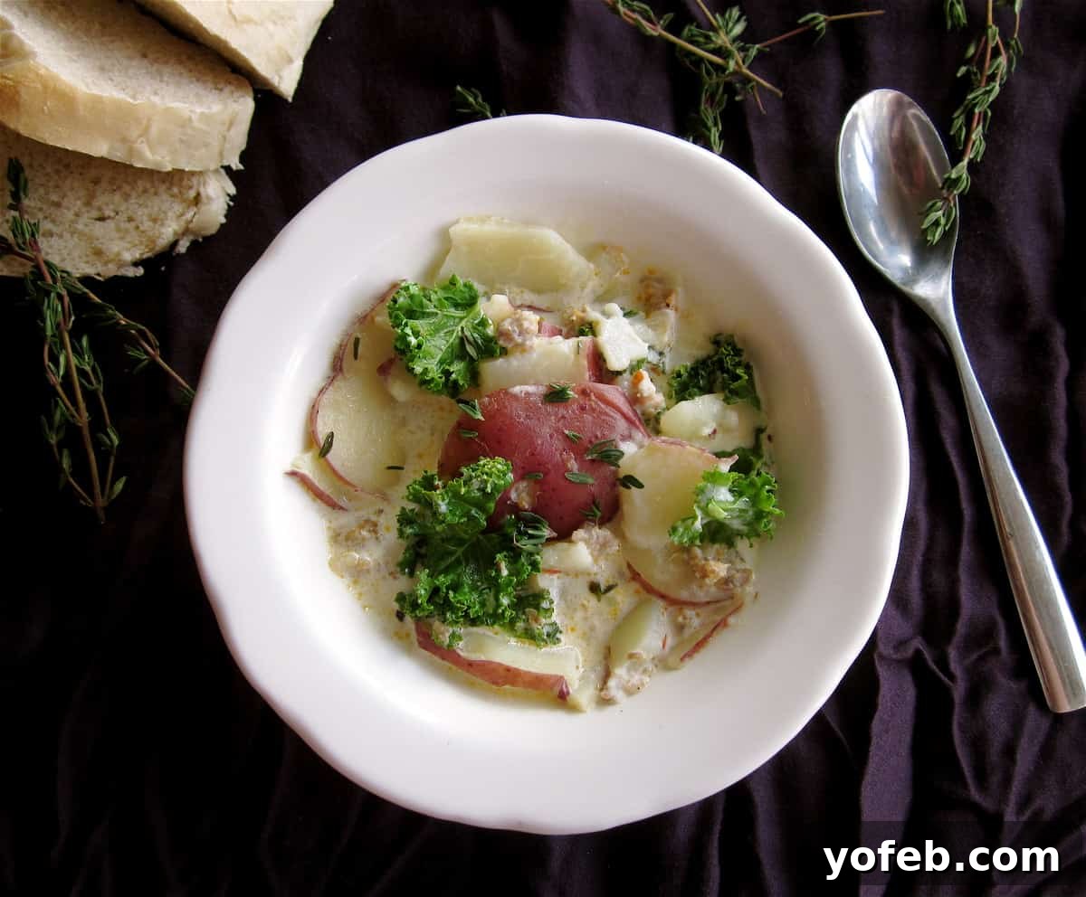 Zuppa Toscana Copycat (Sausage, Potato, and Kale Soup) Original Photo Original photo of Sausage, Potato, and Kale Soup in a white bowl with a spoon and a purple napkin from 2011.