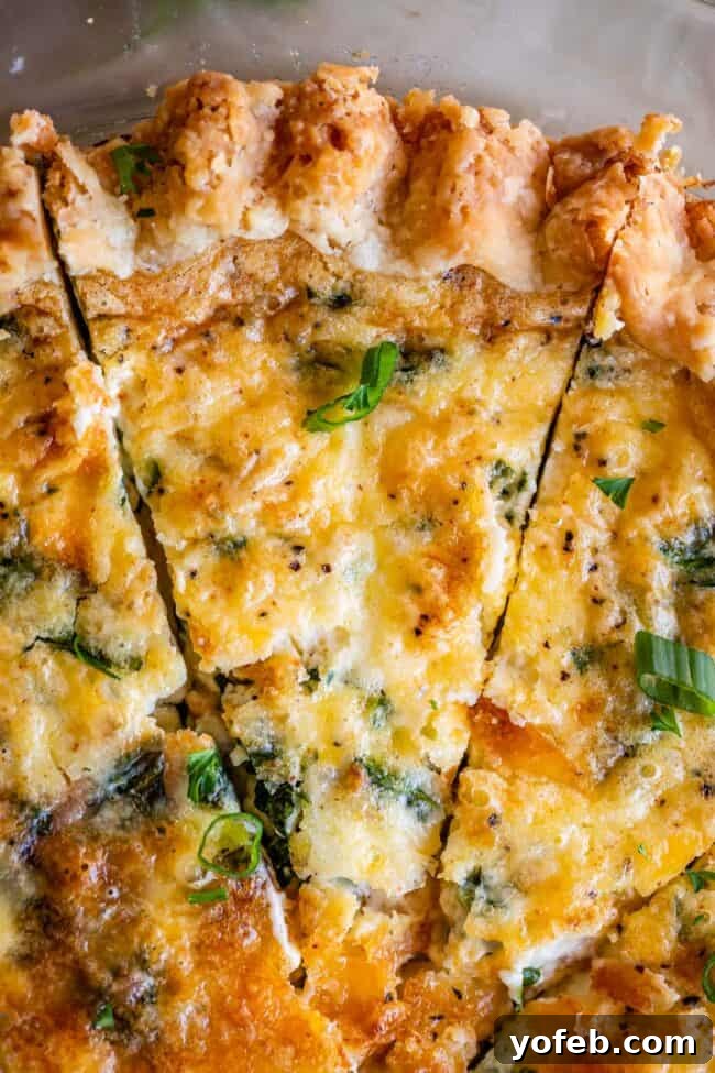 Effortless Bacon and Spinach Quiche 24 An overhead shot of a freshly baked breakfast quiche, generously filled with bacon and spinach, ready to be enjoyed.