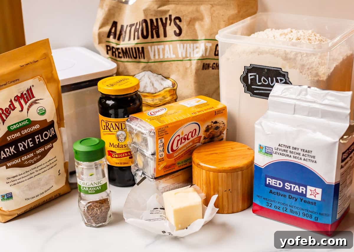 Grandma Prudy's Heirloom Rye Loaf 11 Key ingredients for rye bread including flours, yeast, molasses, and caraway seeds.