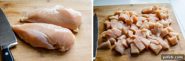 Flavorful Chicken Curry Made Easy 9 raw chicken breast, chopped chicken breasts on a cutting board.