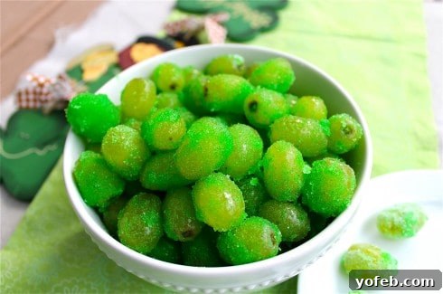 Emerald Zest Bites 2 Vibrant Green Sour Patch Grapes ready for a St. Patrick's Day celebration