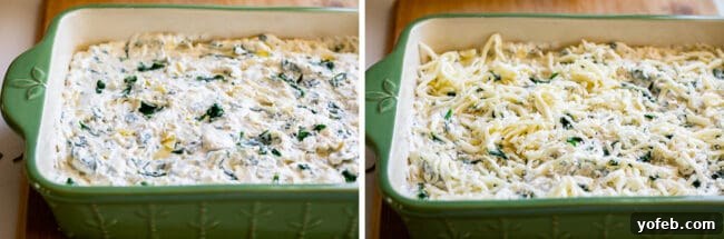 Ultimate Cheesy Spinach Artichoke Dip 16 Spinach artichoke dip neatly spread in a green casserole dish, generously topped with shredded mozzarella cheese.