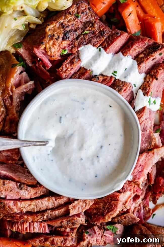 Fiery Homemade Horseradish Sauce 6 horseradish sauce recipe in a white bowl with corned beef.