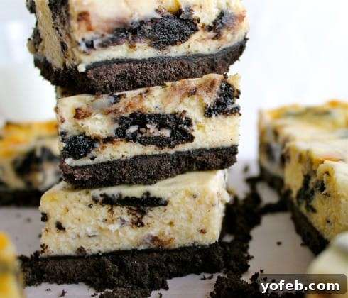 Decadent Oreo Cheesecake Bars 6 Close-up of a single Oreo Cheesecake Bar