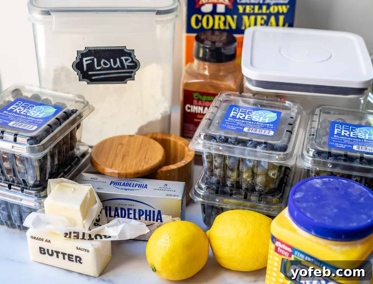 Grandma's Classic Blueberry Pie 9 A selection of blueberry pie ingredients laid out on a table, including flour, sugar, cornstarch, and fresh lemons, ready for baking.