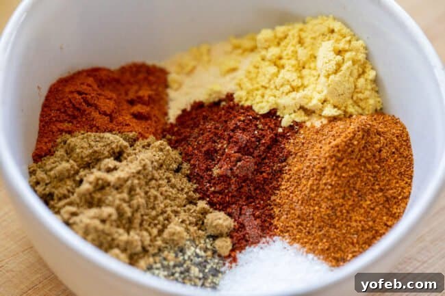 Smoky Perfection: The Ultimate Pulled Pork 8 close up of spices in a white bowl.