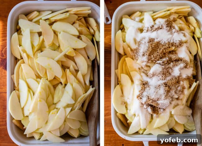 Effortless Homemade Apple Cobbler 14 Thinly sliced apples covered in sugar and brown sugar in a white casserole dish.
