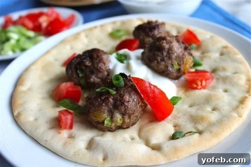 Spiced Lamb Kofta Gyros 6 Lamb Meatball Gyros from TheFoodCharlatan.com