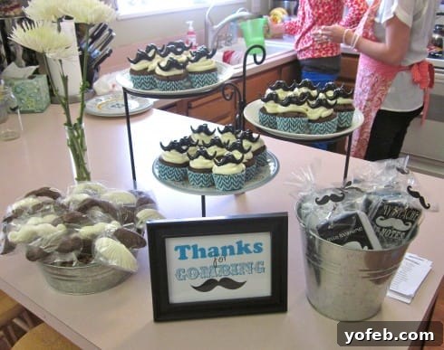 Cupcakes with mustache ring toppers