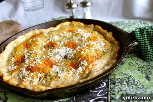 Golden Chicken Parmesan Pot Pie 9 Close-up of a rustic chicken pot pie
