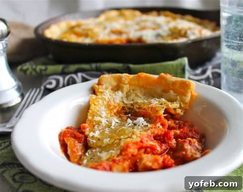 Golden Chicken Parmesan Pot Pie 10 Chicken Parmesan Pot Pie served in a cast iron skillet