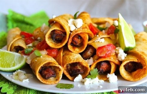 Homemade Chicken Flautas by The Food Charlatan. Seasoned chicken breast, crispy tortillas, and fresh toppings make this an unforgettable Mexican feast. #fried #chicken #flauta #Mexican #easy #authentic #picodegallo #dinner #tortillas #taquitos Crispy Chicken Flautas Recipe with delicious toppings.
