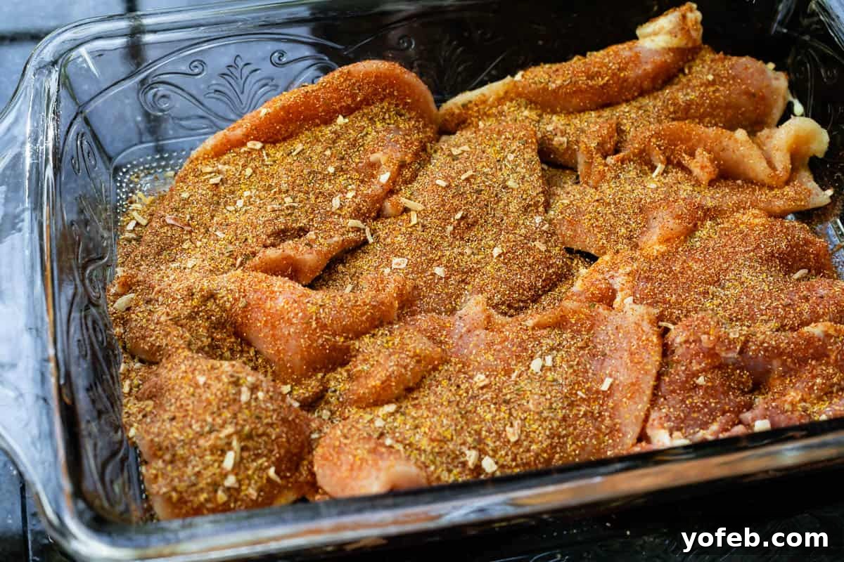 Ultimate Chicken Tacos Quick and Slow Cooker Options 6 raw chicken pieces covered with a dry rub made of many spices to dry marinate.