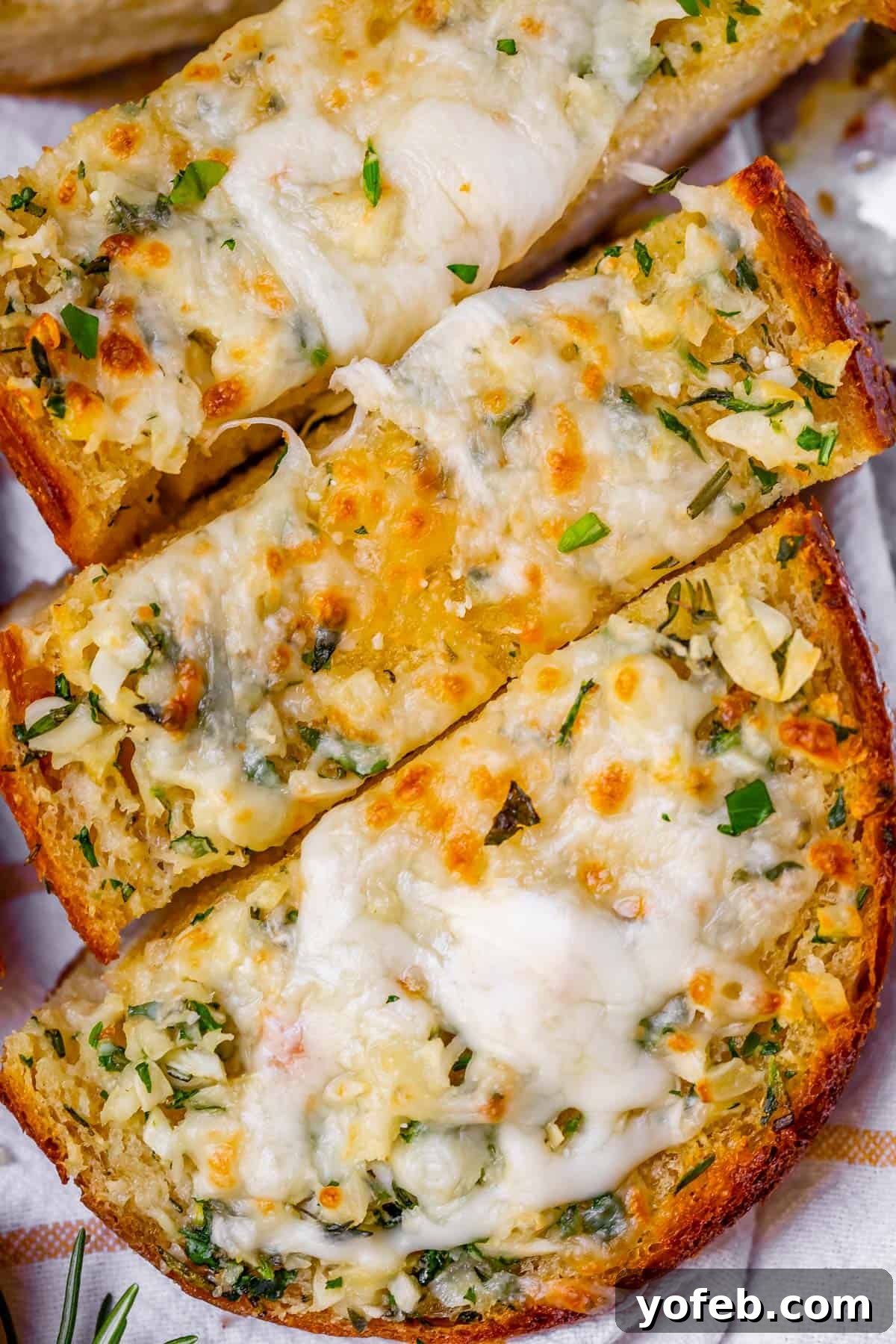 Irresistible Garlic Butter Loaf 8 Easy garlic bread topped with a generous layer of melted cheese and fresh parsley.