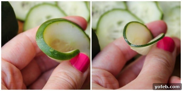 Crisp Asian Cucumber Salad with Tangy Rice Vinaigrette 4 Example of thinly cut and thick cut cucumbers close up held by thumb and forefinger.