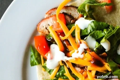 Barbecue Pork Tenderloin Wraps: Your new favorite quick and easy dinner recipe. Delicious Barbecue Pork Wraps, ready for a quick and easy meal