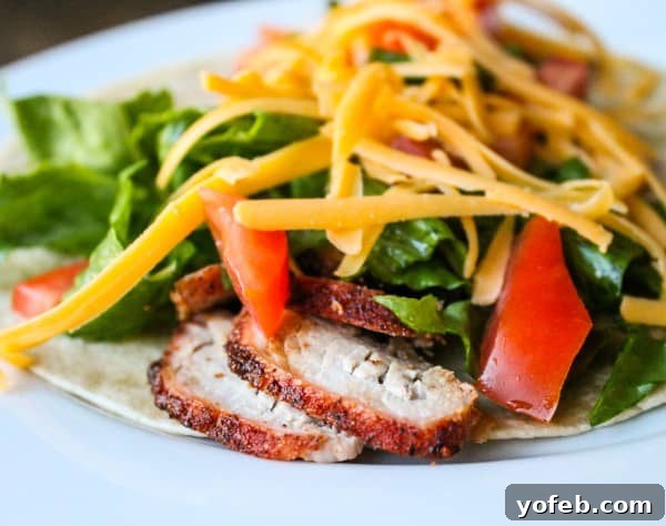 How to assemble Barbecue Pork Wraps Assembling a Barbecue Pork Wrap with fresh ingredients and cooked pork