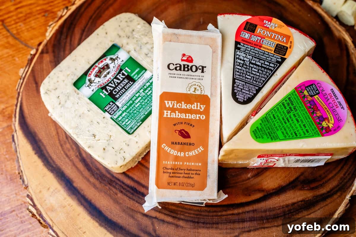Crafting the Perfect Charcuterie Board 14 Arrangement of semi-soft packaged cheeses including havarti with dill, habañero cheddar, fontina, and gouda.