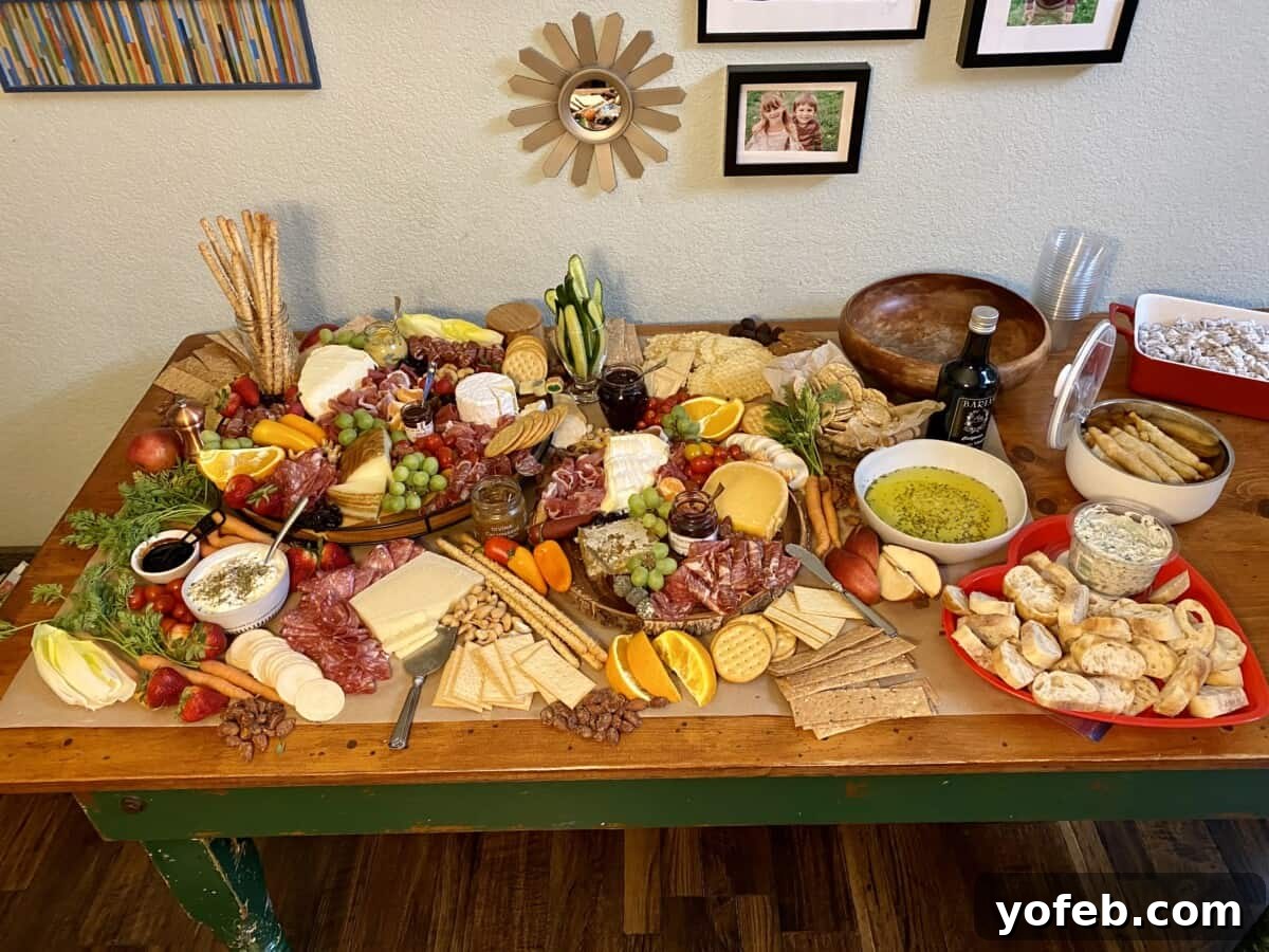 Crafting the Perfect Charcuterie Board 8 Charcuterie spread out on a wood table.