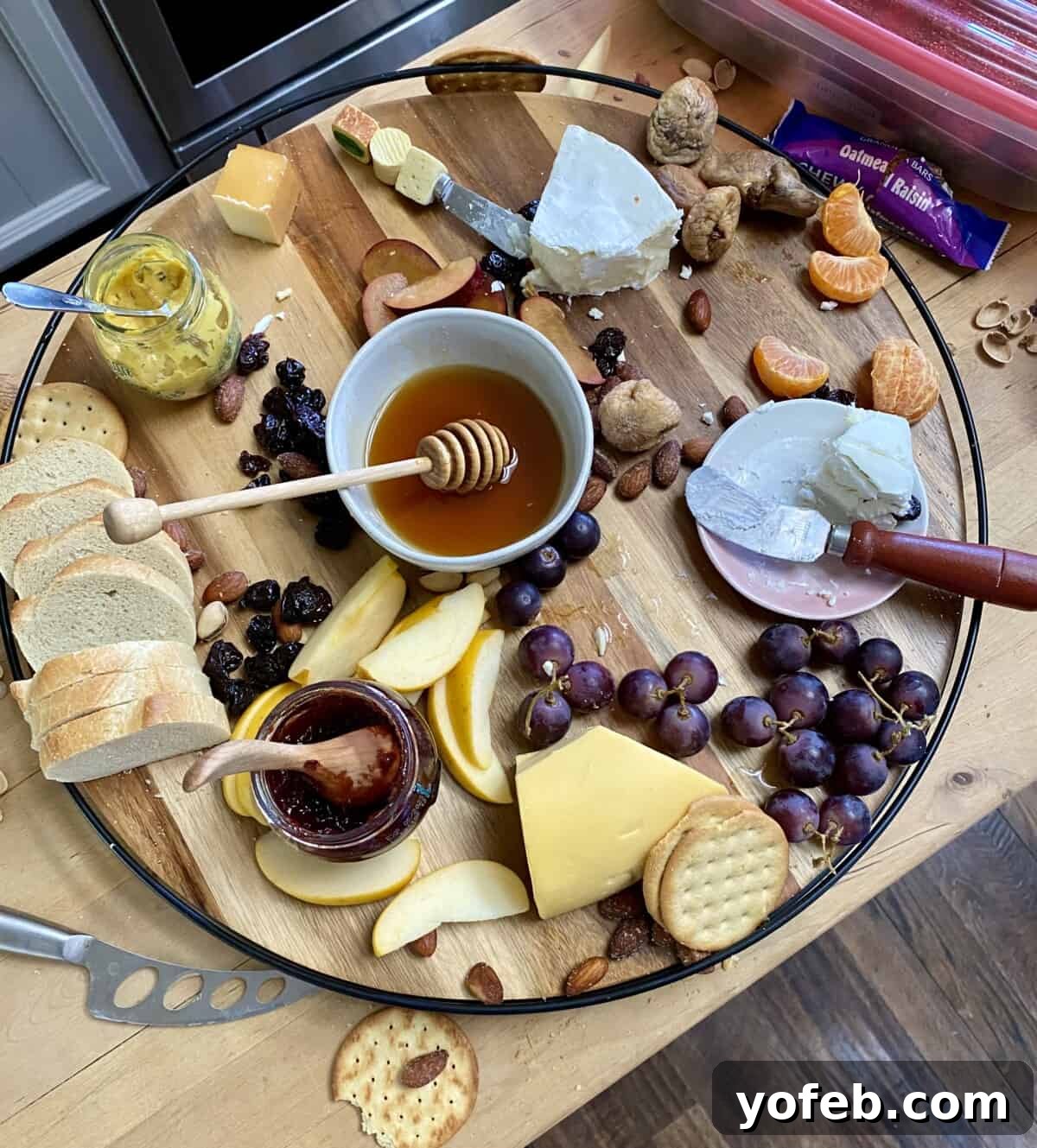 Crafting the Perfect Charcuterie Board 10 overhead shot of half eaten charcuterie board.