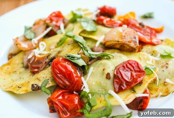 Sun-Kissed Tomato Basil Ravioli 5 Fresh basil scattered over roasted tomatoes and ravioli