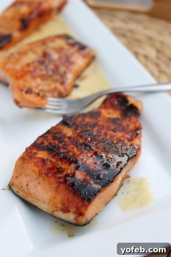 Honey-Glazed Salmon with Nutty Lime Butter Sauce 8 Full plate of honey salmon dinner with lime garnish