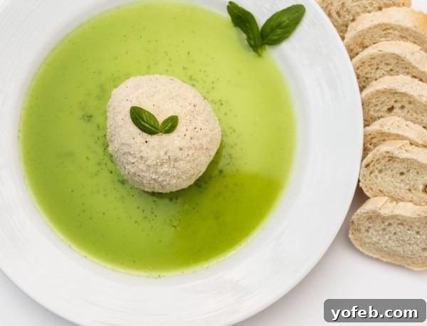 Goat Cheese Parmesan Crisps with Basil Infusion 5 A serving platter of Parmesan Crusted Goat Cheese with Basil Oil and toasted baguette slices, perfect for entertaining