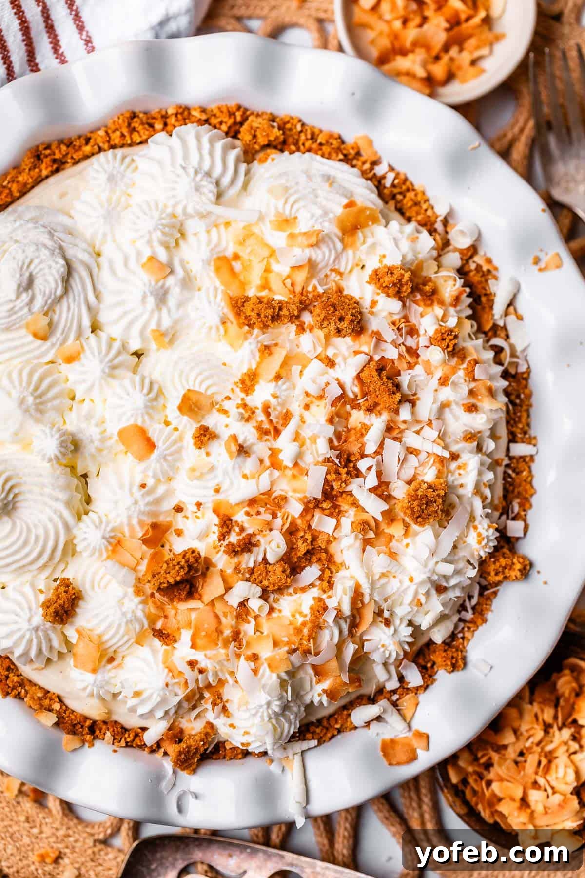 Luscious Caramel Swirled Coconut Cream Pie 4 whole pie, half with just whipped cream, other half with that and coconut, caramel, and crumble toppings.
