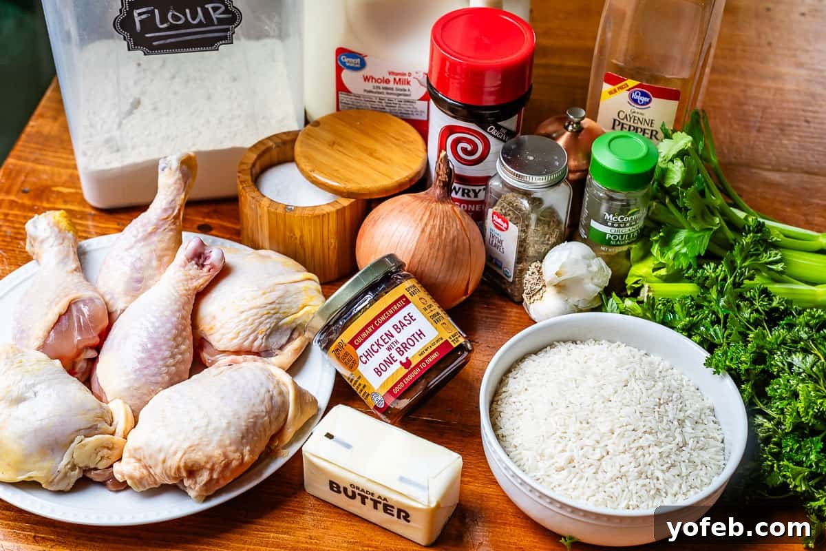Grandma Georgia's Homestyle Chicken and Rice Bake 10 A collection of fresh ingredients laid out on a countertop, including raw chicken pieces, a bowl of white rice, and various spices and vegetables ready for preparing the homemade chicken and rice casserole from scratch.