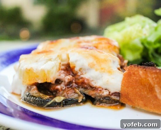 Hearty Greek Moussaka Bake 4 A beautifully assembled Moussaka before baking, topped with creamy béchamel