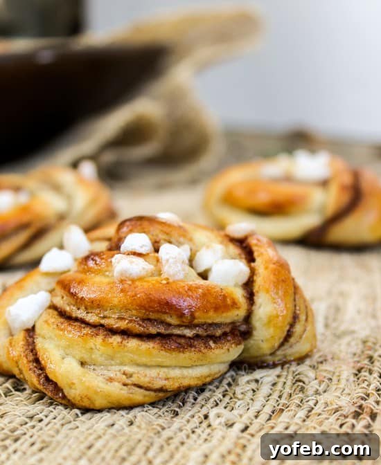 Swedish Cardamom Cinnamon Buns 8 A plate of freshly baked Swedish Cardamom Buns
