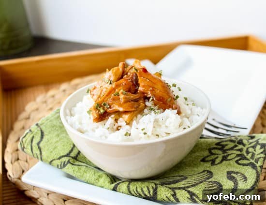 Crockpot Teriyaki Chicken and Rice Bowls 4 Full slow cooker of Teriyaki Chicken simmering, ready to be shredded