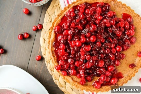 Nutty Brown Butter Cranberry Tart 6 A whole brown-butter cranberry tart, ready to be sliced and served.