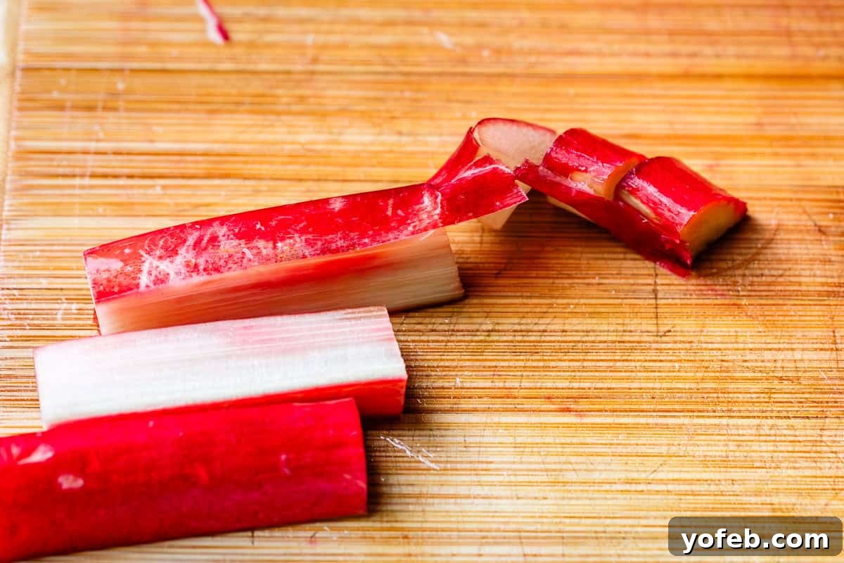 Summer's Sweet & Tart Strawberry Rhubarb Pie 12 chopped rhubarb with some ribbony string still attached that the knife struggled to cut through.