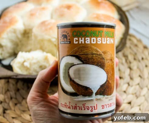Dough for Samoan Coconut Rolls, showing full-fat coconut milk being used.