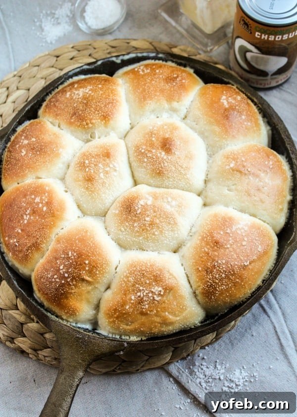 Sweet Fluffy Samoan Coconut Rolls 8 A plate of Samoan Coconut Rolls, invitingly soft and golden
