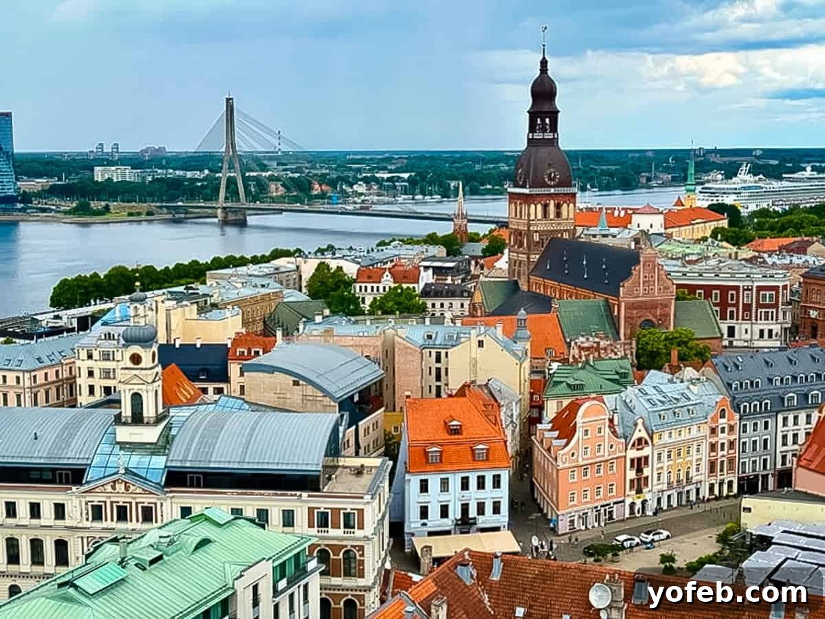 Unlock the Charm of the Baltics 82 A stunning high-angle photo of Riga, showcasing its river, historic churches, and red-tiled roofs.