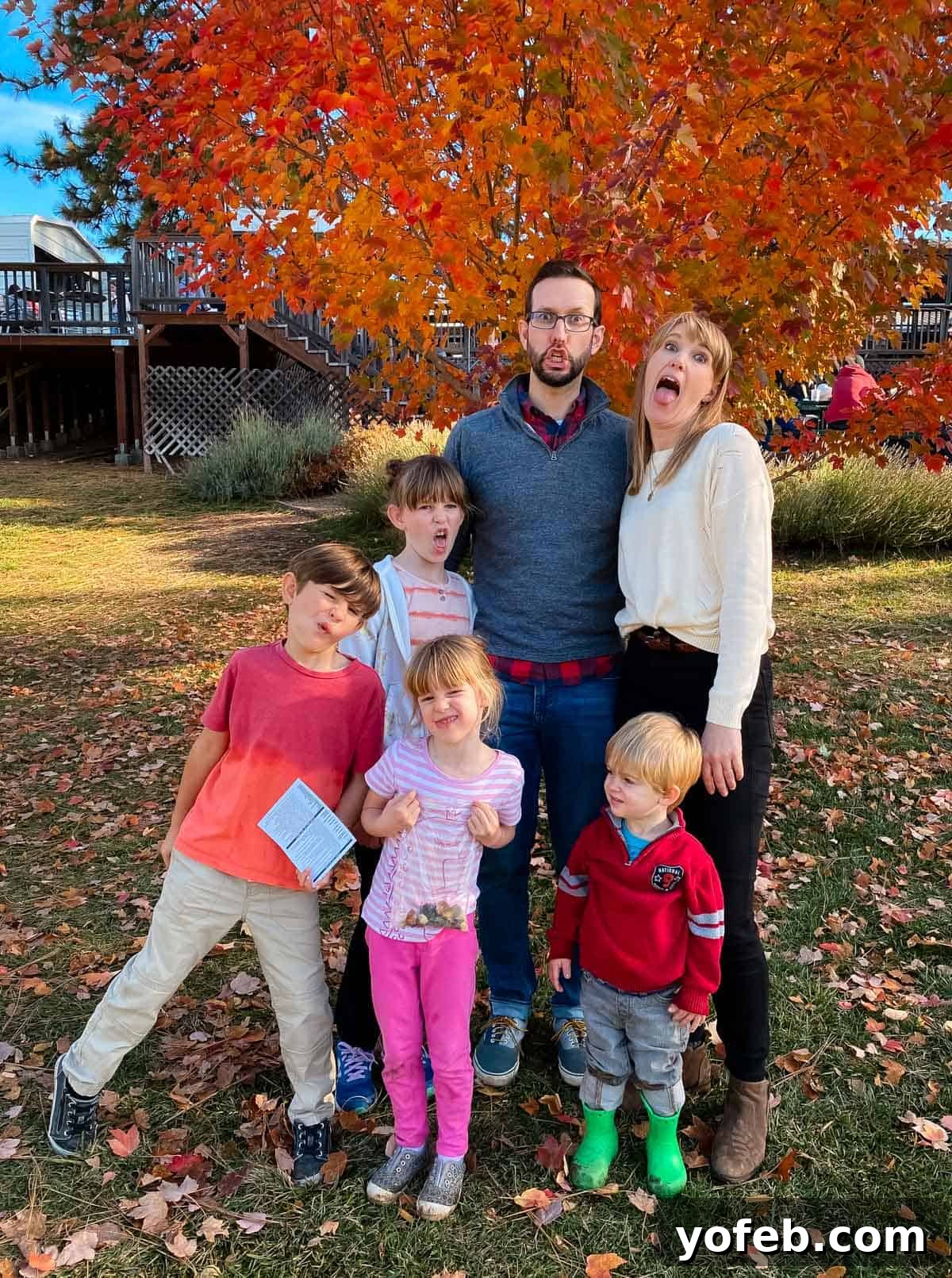 Dreamy Salted Caramel Sauce 4 My family and I making silly faces amidst vibrant fall leaves at Apple Hill, creating cherished memories.