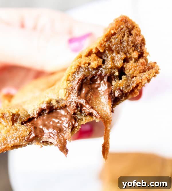 Browned Butter Blondies Swirled with Sea Salt Butterscotch Caramels 9 A measuring cup filled with rich, golden browned butter, ready for blondie batter.
