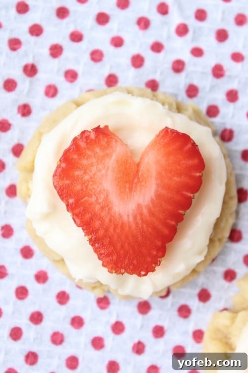 Sweetheart Cookies with a Snowy Coconut Crown 5 Coconut-Frosted Sugar Cookies with Strawberry Hearts - Platter