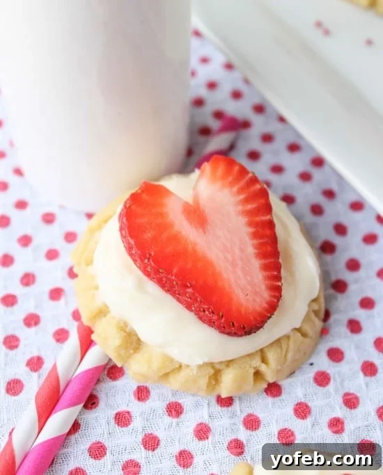 Sweetheart Cookies with a Snowy Coconut Crown 6 Coconut-Frosted Sugar Cookies with Strawberry Hearts - Decorated