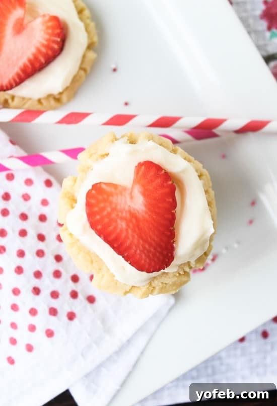 Sweetheart Cookies with a Snowy Coconut Crown 8 Coconut-Frosted Sugar Cookies with Strawberry Hearts - Dough Prep